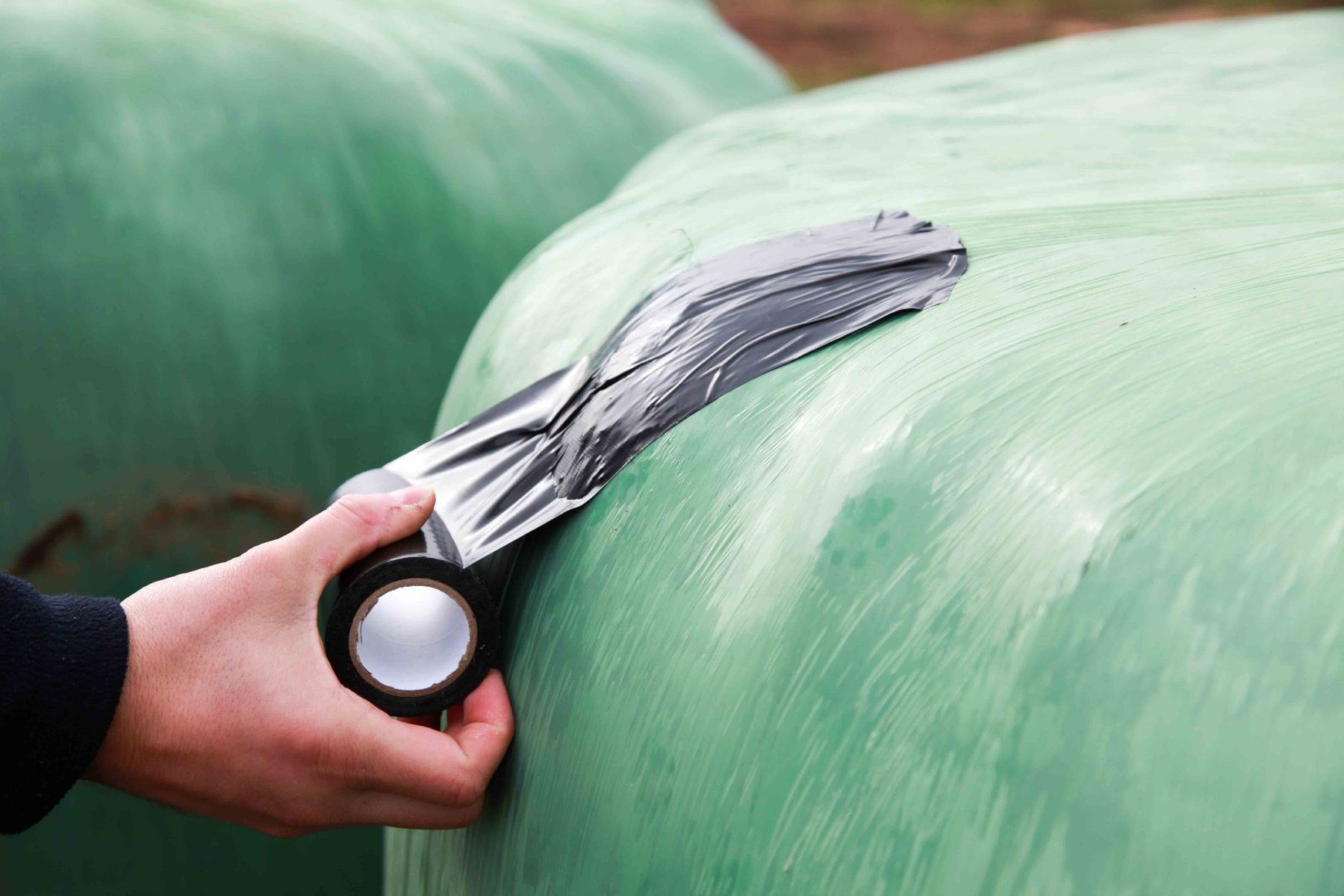 Ruban adhésif de réparation d'enrubannage noir 