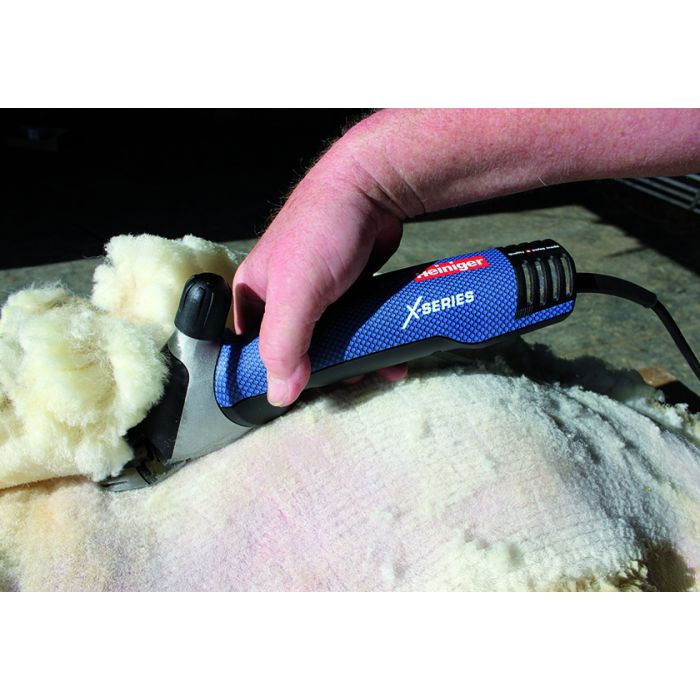 Tondeuse Heiniger Xpert avec un bon d'affûtage et un bon pour un jeu de peignes